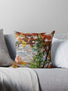 Backlit Fall Leaves Against Weathered Rock Throw Pillow