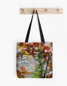 Backlit Fall Leaves Against Weathered Rock Tote Bag